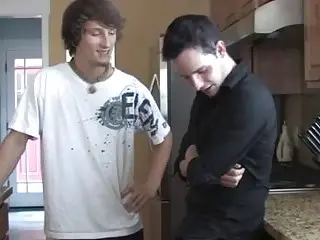 Young gay guys suck each other off in the kitchen