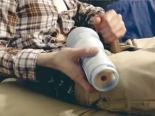 Mostly clothed man thrusts into a fleshlight