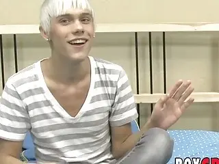 Young gay man playing with his dick during an interview