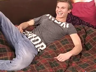 Twink strokes his cock before cumming